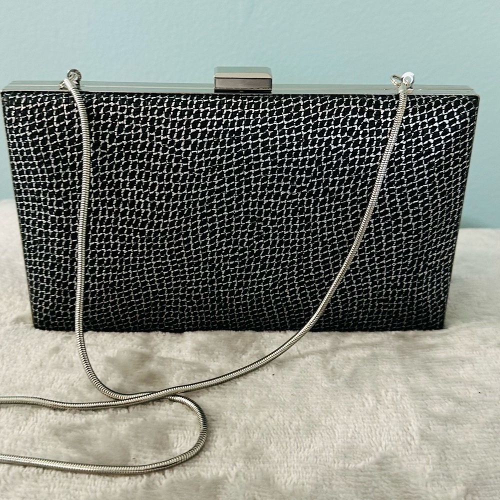 Elegant Black and Silver Clutch Bag with silver trim